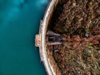 an aerial view of a bridge over a body of water by spiros xanthos courtesy of Unsplash.